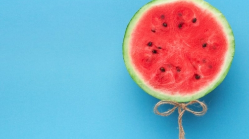 watermelon-balloon-on-blue-background-creative-57PNH8Q