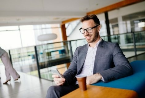 businessman-taking-a-break-with-a-cup-of-coffee-JW4B3DH-470x318