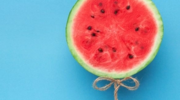 watermelon-balloon-on-blue-background-creative-57PNH8Q-583x583