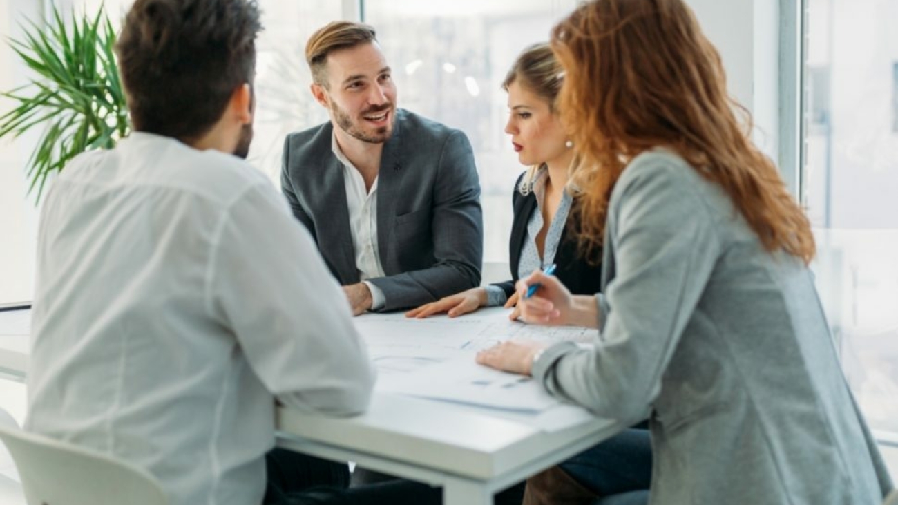 business-people-working-together-on-project-and-5FHSKBL-970x728