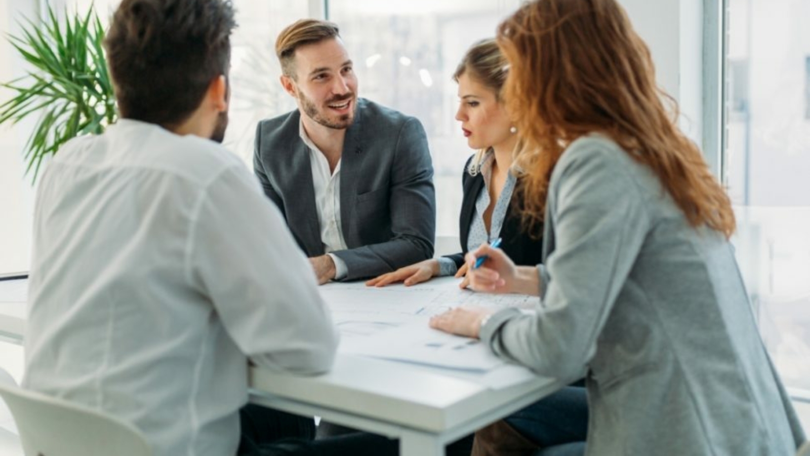 business-people-working-together-on-project-and-5FHSKBL-970x728