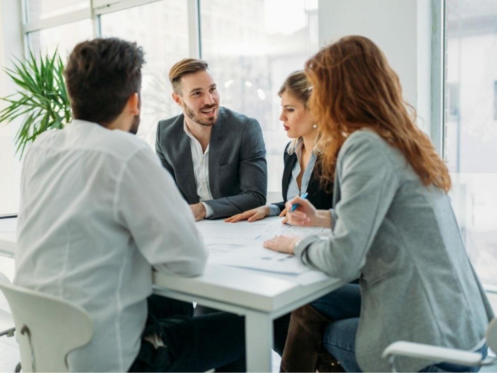 business-people-working-together-on-project-and-5FHSKBL-970x728