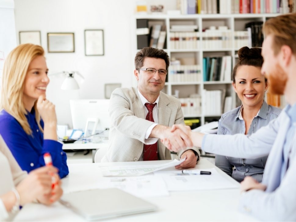 group-of-business-people-working-as-team-in-9HPC4DK-1-970x728