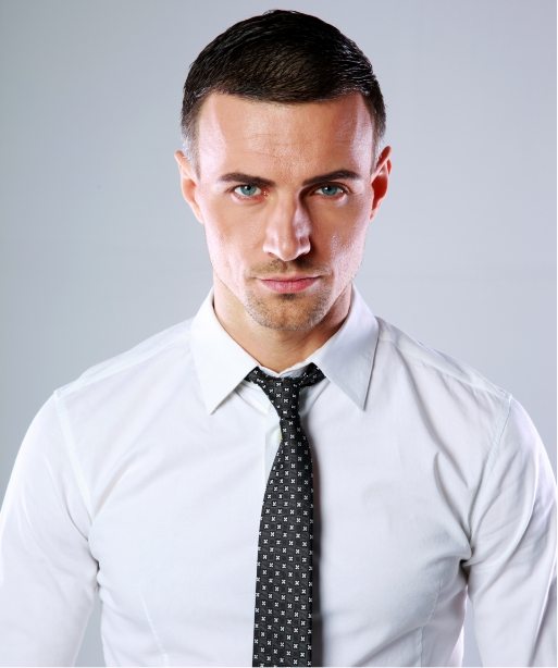 portrait-of-a-confident-man-over-gray-background-PDL3Q9F