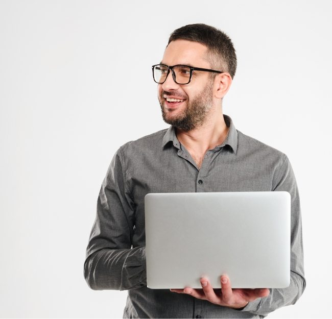 concentrated-businessman-using-laptop-computer-PE3ARHB