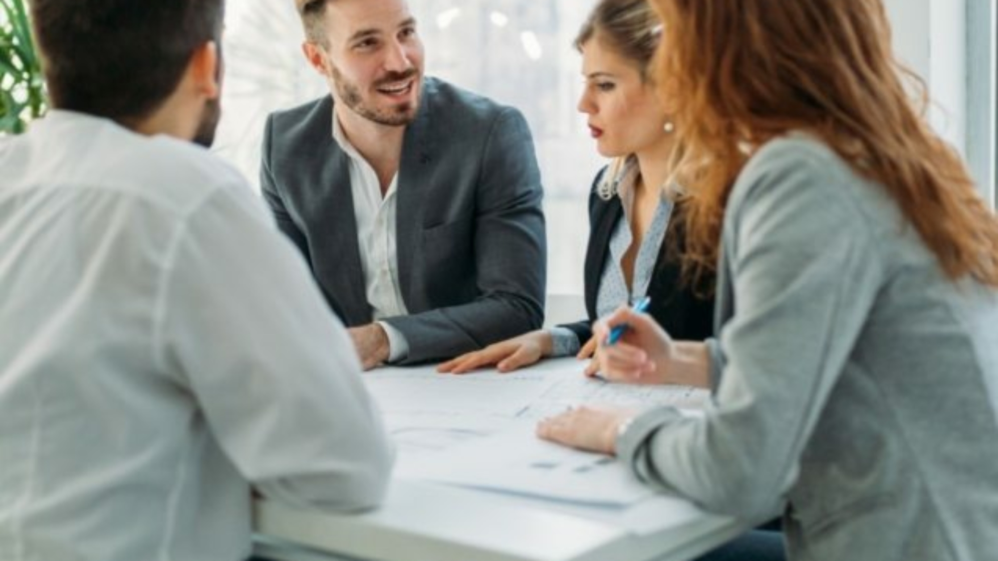 business-people-working-together-on-project-and-5FHSKBL-637x637
