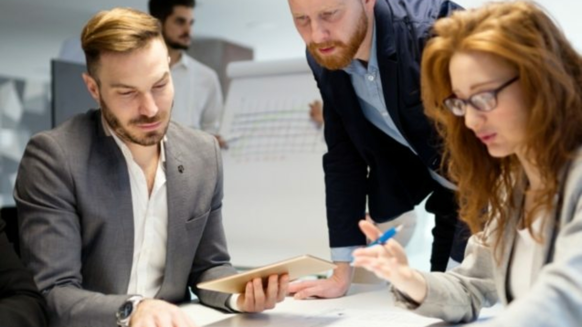 business-people-working-together-on-project-and-B3MZ4TX-637x637