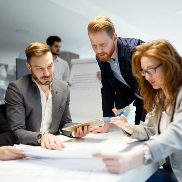 business-people-working-together-on-project-and-B3MZ4TX-637x637